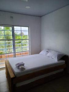 Katil atau katil-katil dalam bilik di Olamar Hostal