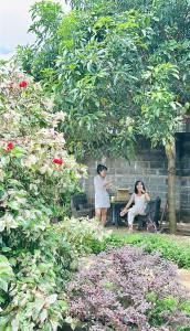 Homestay Buôn Mê 4外面的花园