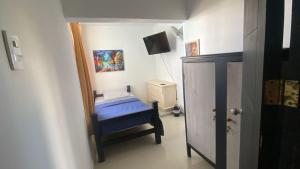 Postel nebo postele na pokoji v ubytování Casa Lina