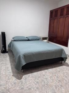 Postel nebo postele na pokoji v ubytování ApartahotelVacacionalSangil