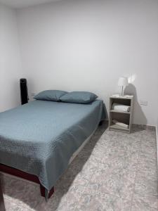 Postel nebo postele na pokoji v ubytování ApartahotelVacacionalSangil