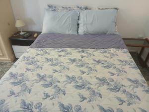 Кровать или кровати в номере Praia Botafogo 5 minutos Copacabana, completo, SmarTV e metrô perto