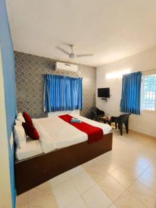 Ένα ή περισσότερα κρεβάτια σε δωμάτιο στο KK Beach View Residency +37 φωτογραφίες