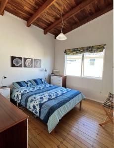 Ένα ή περισσότερα κρεβάτια σε δωμάτιο στο GIVE305A - Modern Funky Bach