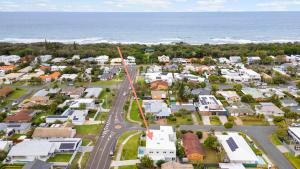 an aerial view of a small town by the ocean at Bluebird Villa - 3min Stroll to Bokarina Beach in Bokarina
