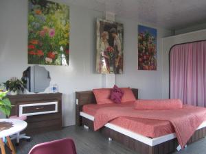 Ένα ή περισσότερα κρεβάτια σε δωμάτιο στο Relax Home