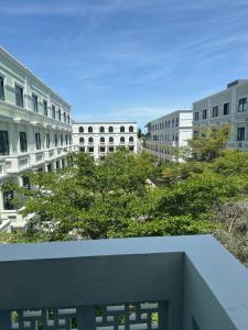 a view of buildings in a city with trees at 118 Orchid in Phú Quốc