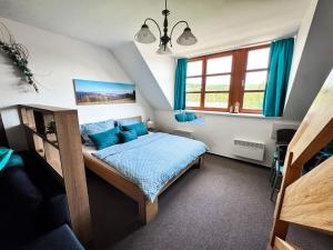 Postel nebo postele na pokoji v ubytování Skiapartma - Říčky v Orlických horách + 61 fotografií