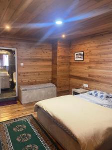 Postel nebo postele na pokoji v ubytování Norbu Thungkar Homestay