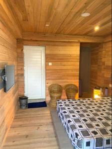 Postel nebo postele na pokoji v ubytování Norbu Thungkar Homestay