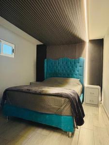 Postel nebo postele na pokoji v ubytování Depa Frente al aeropuerto hasta 12 Huéspedes