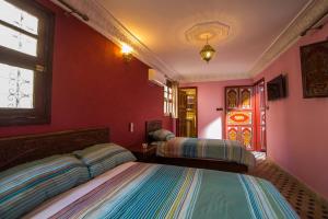 Letto o letti in una camera di Dar El Mathaf