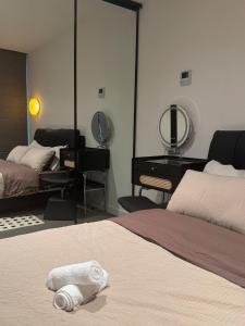 Postel nebo postele na pokoji v ubytování Mel Stylish living