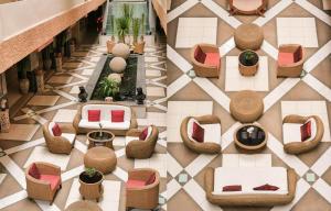 an overhead view of a lobby with chairs and tables at The Mansion Pakchong in Pak Johng