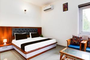 Postel nebo postele na pokoji v ubytování Hotel O ADVENT HOTEL