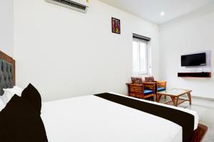 TV a/nebo společenská místnost v ubytování Hotel O ADVENT HOTEL