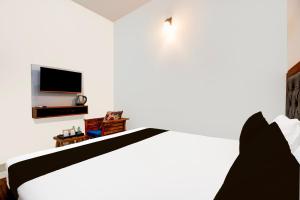 TV a/nebo společenská místnost v ubytování Hotel O ADVENT HOTEL