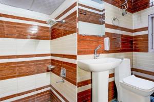 Koupelna v ubytování Hotel O ADVENT HOTEL