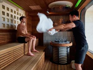 a couple of men in a sauna at seven x seven ISHIGAKI in Ishigaki Island +197 photos