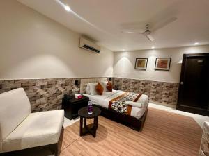 Posezení v ubytování Hotel Grand Arcasia Saket- Near PVR Anupam