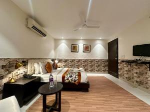 Posezení v ubytování Hotel Grand Arcasia Saket- Near PVR Anupam