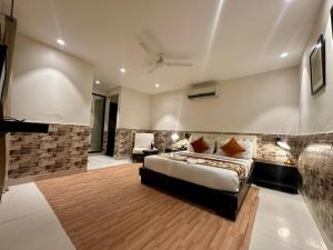Posezení v ubytování Hotel Grand Arcasia Saket- Near PVR Anupam