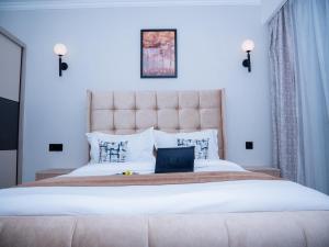 Postel nebo postele na pokoji v ubytování RW Homes + 21 fotografií