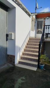 a set of stairs in front of a house at Casa Marcelino in Reinante +2 photos