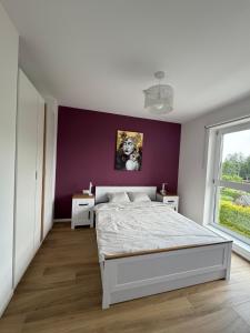 Ένα ή περισσότερα κρεβάτια σε δωμάτιο στο Apartament Pod Żaglami +15 φωτογραφίες