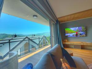 Μια τηλεόραση ή/και κέντρο ψυχαγωγίας στο Apartamenty Szóstka - Kamienna 1D