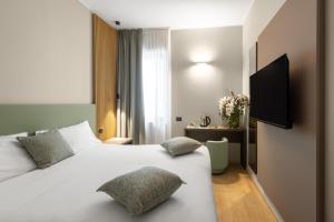 Postel nebo postele na pokoji v ubytování Energy Park Hotel