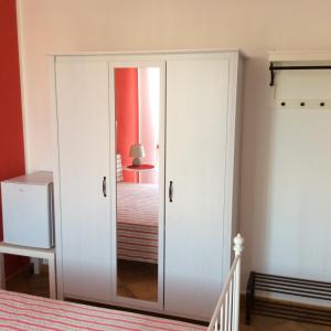 Ένα ή περισσότερα κρεβάτια σε δωμάτιο στο B&B in Residence "...a due passi dalla Scala dei Turchi"