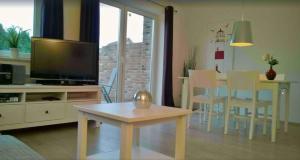 Η κουζίνα ή μικρή κουζίνα στο Ferienhaus Leuchtturm
