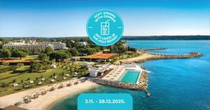 an aerial view of a resort with a pool at Aminess Vival Maestral Hotel in Novigrad Istria