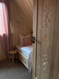 Łóżko lub łóżka w pokoju w obiekcie Stylowa Chata