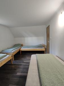 Postel nebo postele na pokoji v ubytování Sipi Kulcsosházak + 37 fotografií