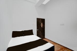 Postel nebo postele na pokoji v ubytování HOTEL O FOOD PLAZA + 23 fotografií