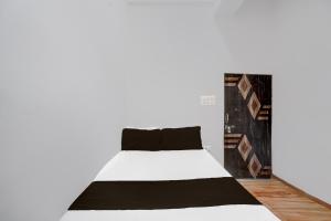 Postel nebo postele na pokoji v ubytování HOTEL O FOOD PLAZA