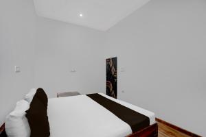 Postel nebo postele na pokoji v ubytování HOTEL O FOOD PLAZA