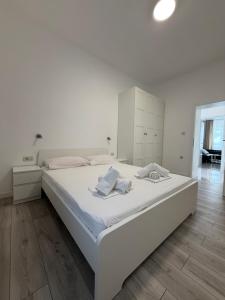 Postel nebo postele na pokoji v ubytování Sesar Apartments Krk - No. 1 Iva