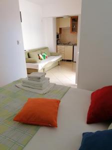 Postel nebo postele na pokoji v ubytování Apartments Markota