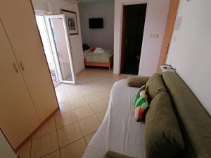 Postel nebo postele na pokoji v ubytování Apartments Markota