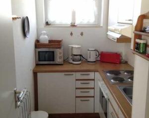 Kuchyň nebo kuchyňský kout v ubytování Ferienwohnung Wöhrmeyer + 3 fotografie