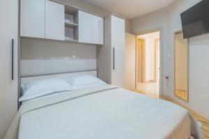 Postel nebo postele na pokoji v ubytování Turta apartment