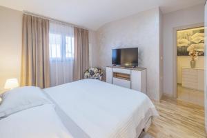 Postel nebo postele na pokoji v ubytování Turta apartment