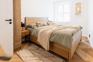 Voodi või voodid majutusasutuse Hop Nest Žatec centrum apartment toas