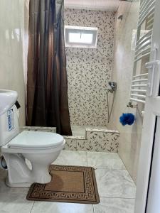 Koupelna v ubytování Nunu's Guesthouse