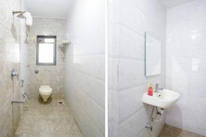 Koupelna v ubytování FabHotel Rio House Apartment