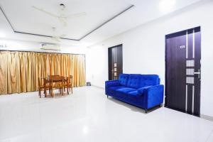 Posezení v ubytování FabHotel Rio House Apartment