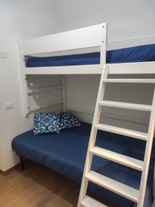 En eller flere senge i et værelse på I Carusi + 2 billeder